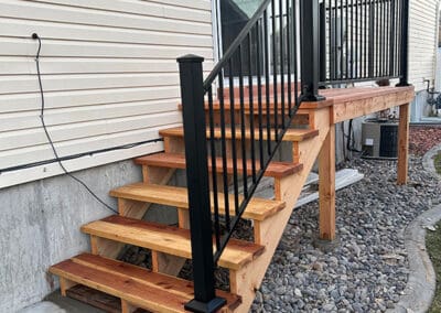 Deck and stairs with custom handrail