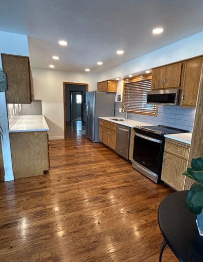 Kitchen with hardwood flooring